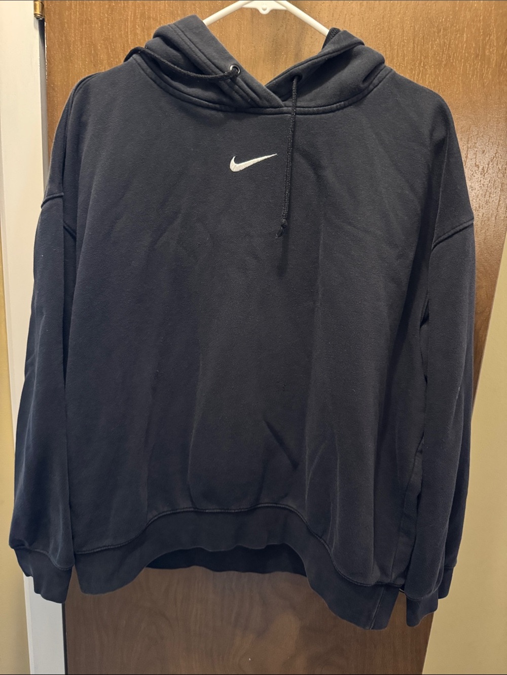 Nike Black Hoodie with White Swoosh Center Logo